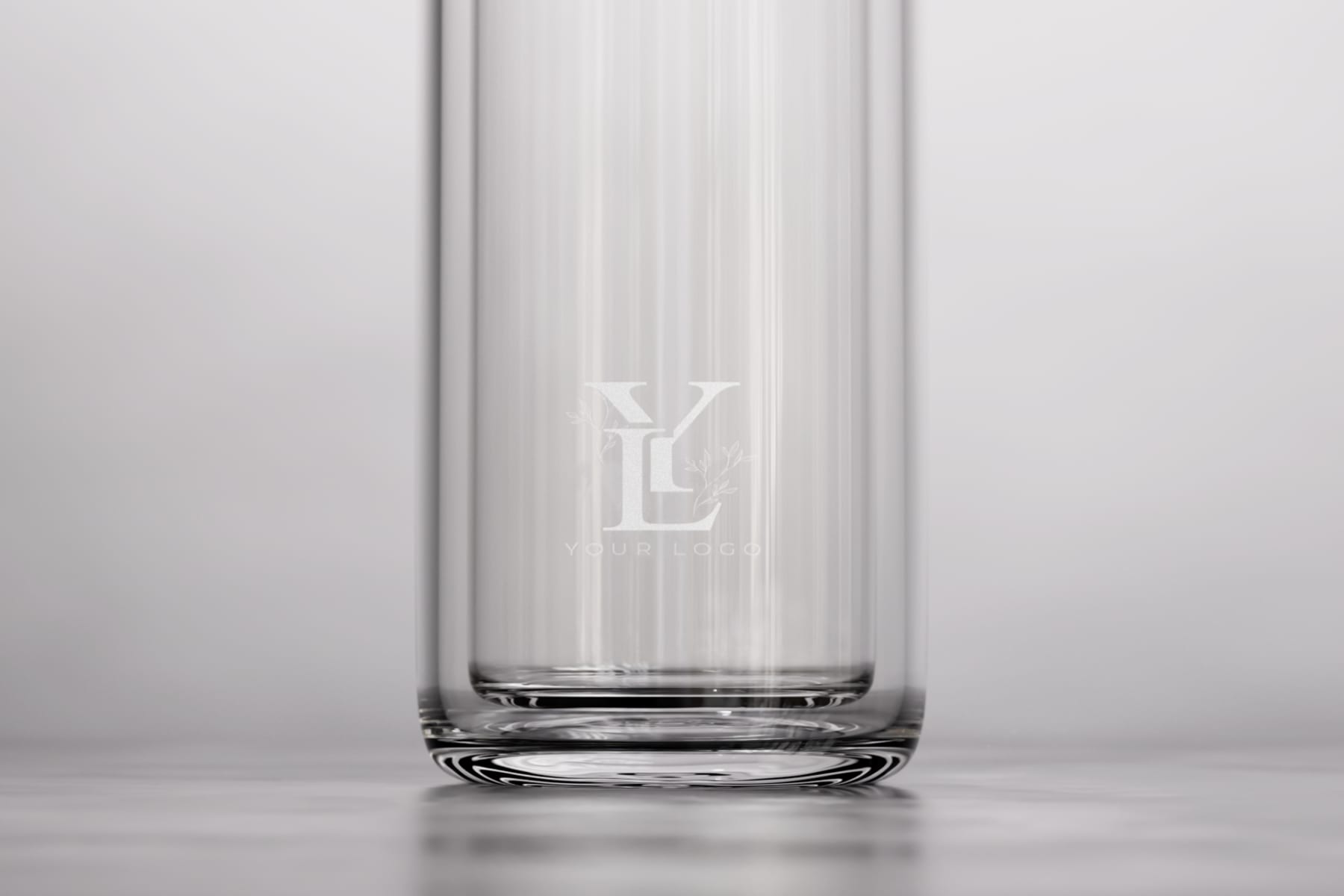 An Ever Vessel Glass Multi double walled glass tea infuser bottle with a rose pink lid and corporate logo laser engraved on the side