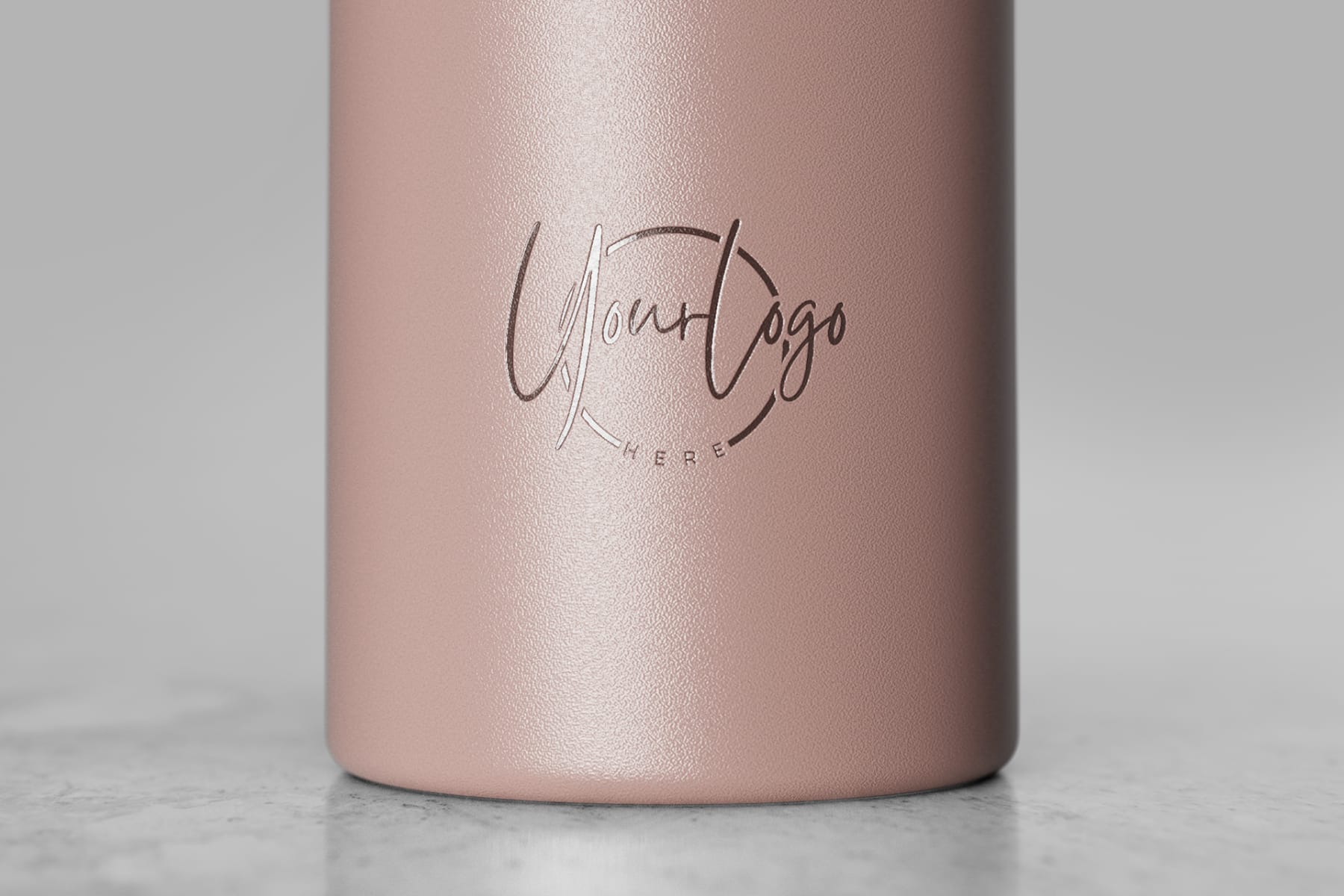 An Ever Vessel Mini Rose small water bottle with a corporate logo laser engraved on the side