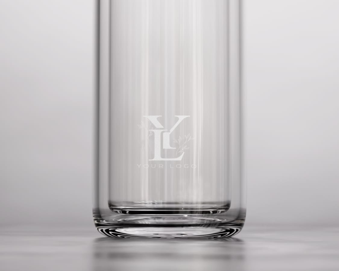 An Ever Vessel Glass Multi double walled glass tea infuser bottle with a rose pink lid and corporate logo laser engraved on the side