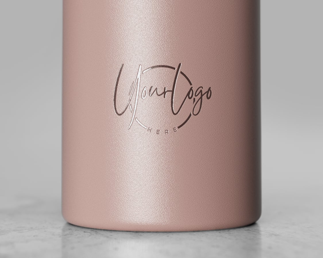 An Ever Vessel Mini Rose small water bottle with a corporate logo laser engraved on the side