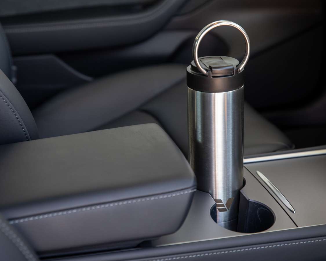 Ever Vessel Maxi Water Bottle 26oz 750mL in stainless sitting in car cup holder