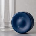 Personalized Ever Vessel Glass Multi double walled glass tea infuser bottle with the blue lid removed showing the laser engraved name.