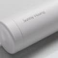 Personalized Ever Vessel Multi White Sand tea infuser water bottle with laser engraved name Sunny Huang on the side.