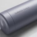 Personalized Ever Vessel stainless steel water bottle in lilac with laser engraved name Isabella Grace on the side.