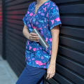 Ever Vessel Stainless Steel Mini Water bottle with no paint held by female nurse putting into pocket