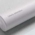 Personalized Ever Vessel Mini White Sand small water bottle with laser engraved name Olivia Johnston on the side.
