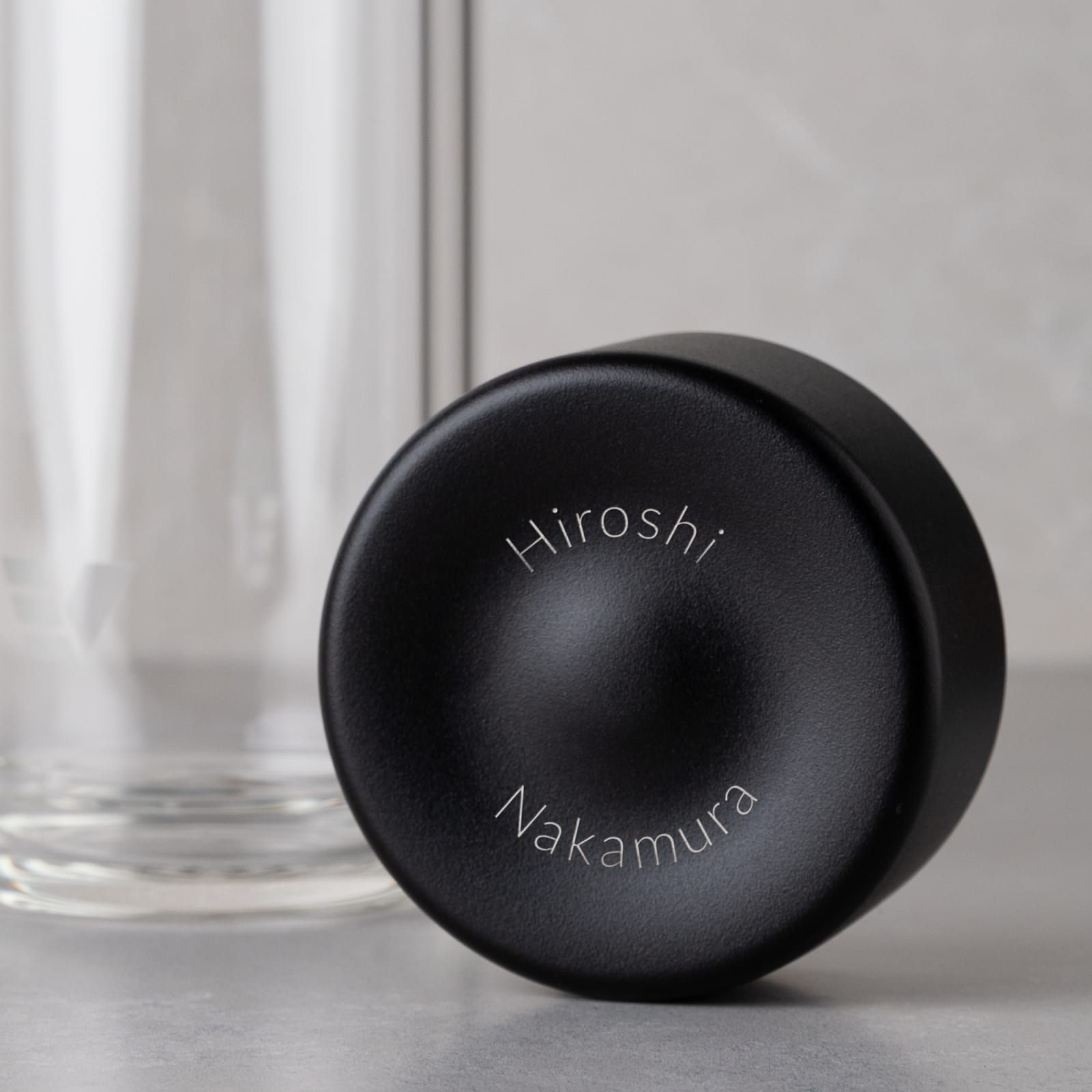 Personalized Ever Vessel Glass Multi double walled glass tea infuser bottle with the black lid removed showing the laser engraved name.