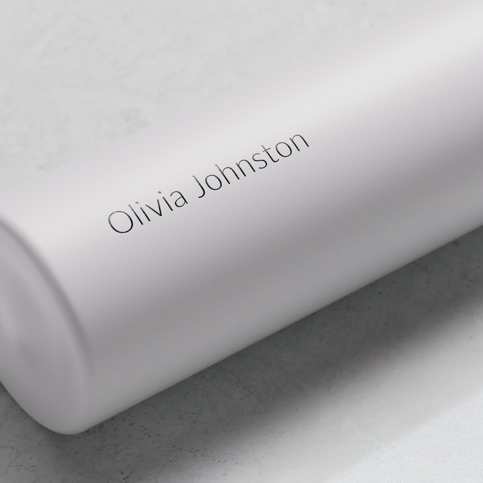 Personalized Ever Vessel Mini White Sand small water bottle with laser engraved name Olivia Johnston on the side.