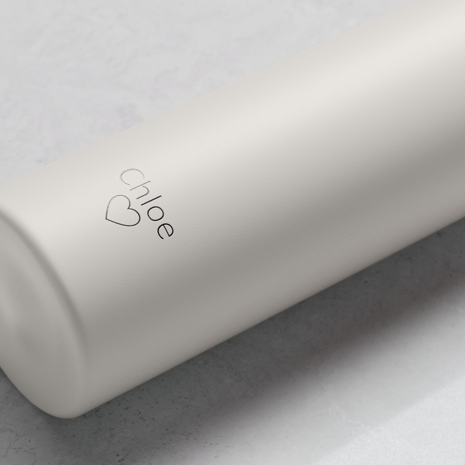 Personalized Ever Vessel Mini Luna White small water bottle with laser engraved text Chloe & a love heart emoji on the side.