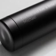 Personalized Ever Vessel Multi Black tea infuser water bottle with laser engraved text on the side.