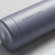 Personalized Ever Vessel stainless steel water bottle in lilac with laser engraved name Isabella Grace on the side.