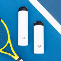 Ever Vessel Super Maxi and Maxi White Sand stainless steel water bottles on a tennis court.