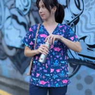 Ever Vessel Stainless Steel Mini Water bottle with no paint held by female nurse