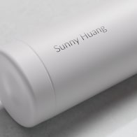Personalized Ever Vessel Multi White Sand tea infuser water bottle with laser engraved name Sunny Huang on the side.
