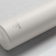 Personalized Ever Vessel Mini Luna White small water bottle with laser engraved text Chloe & a love heart emoji on the side.