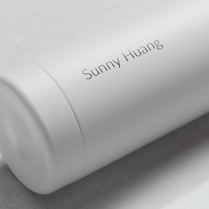 Personalized Ever Vessel Multi White Sand tea infuser water bottle with laser engraved name Sunny Huang on the side.