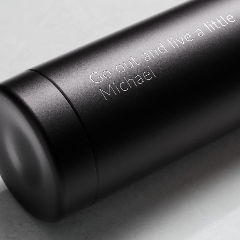 Personalized Ever Vessel Multi Black tea infuser water bottle with laser engraved text on the side.