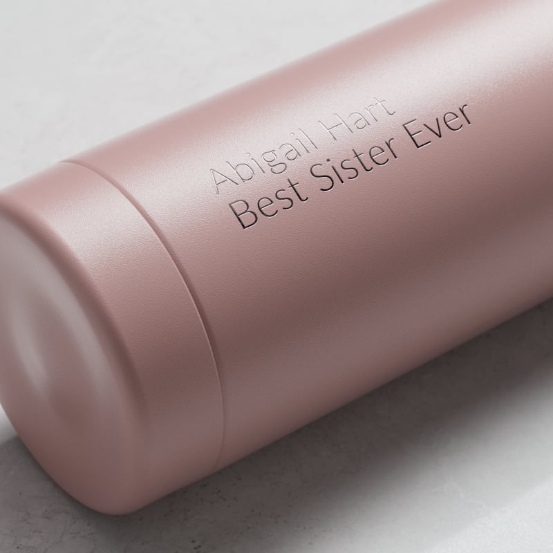 Personalized Ever Vessel Multi Rose Pink tea infuser water bottle with laser engraved name Abigail Hart on the side.