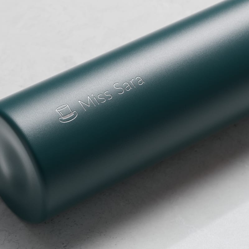 Personalized Ever Vessel Mini Teal green small water bottle with laser engraved name Miss Sara and emoji on the side.