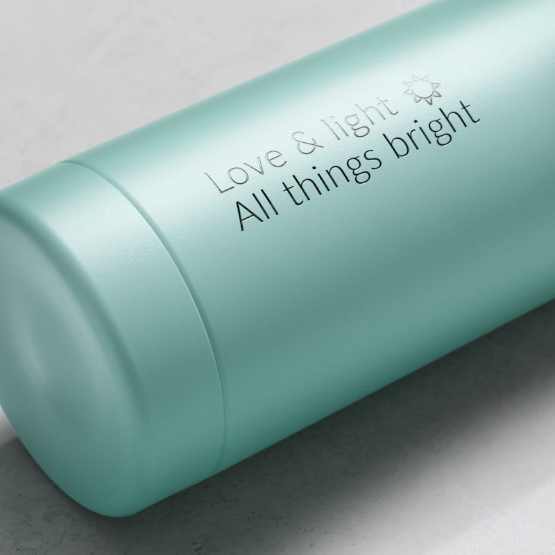 Personalized Ever Vessel stainless steel water bottle in mint green with laser engraved message Love & light  All things bright with emoji on the side.