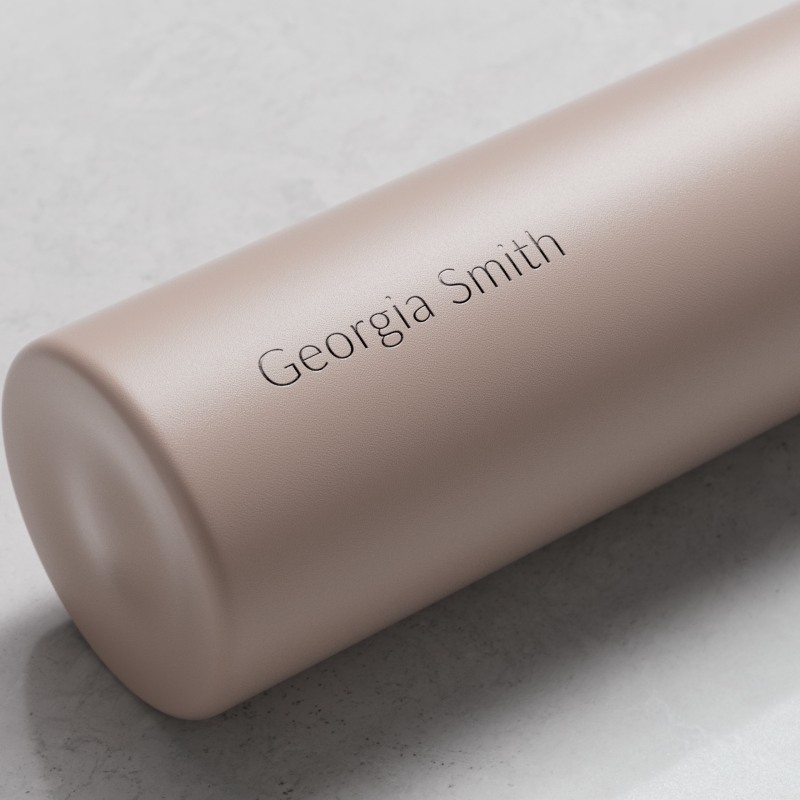 Personalized Ever Vessel Mini Desert Beige small water bottle with laser engraved name Georgia Smith on the side.