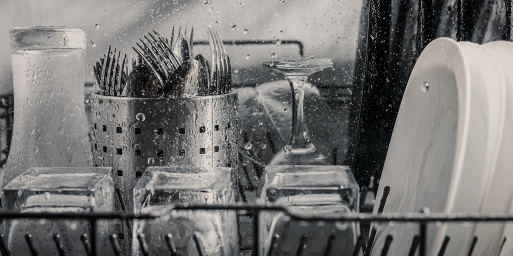 Image showing inside a dishwasher cleaning dishes